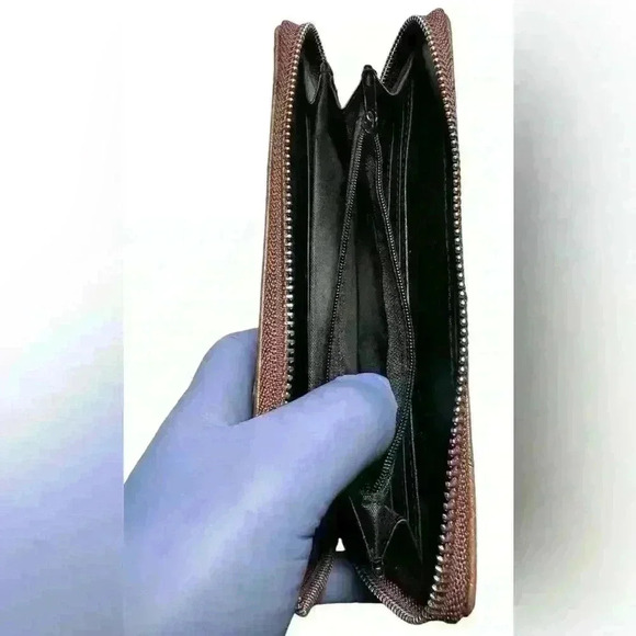 A woman’s brown wallet with ostrich leather print type pattern. - Picture 8 of 12